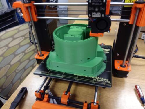 The 2019 hatch capture mechanism in the middle of printing.